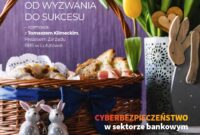 Okładka magazynu 'Twój bank' przedstawiająca koszyk wielkanocny z biało-niebieską wstążką, wypełniony pieczywem i ozdobiony figurkami dwóch króliczków. Obok koszyka znajduje się wazon z żółtymi tulipanami i drewnianą ozdobą w kształcie króliczych uszu. Na okładce widoczne są tytuły artykułów: 'Od wyzwania do sukcesu – rozmowa z Tomaszem Klimeckim, Prezesem Zarządu RBS w Lututowie', 'Cyberbezpieczeństwo w sektorze bankowym' oraz 'Warto być w Lidze Biznesu'. W prawym dolnym rogu logo Rejonowego Banku Spółdzielczego w Lututowie.